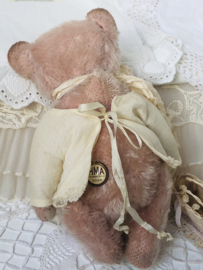 Hug Me Again Collectible bear "Little Livia" standing about 7 inch tall.