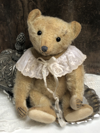 Hug Me Again Collectible bear "Esmeray" standing about 10.5 inch tall.