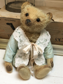 Hug Me Again Collectible bear "Channella" standing about 10" inch tall.