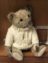 Hug Me Again Collectible bear "Xavier" standing about 11 inch tall.
