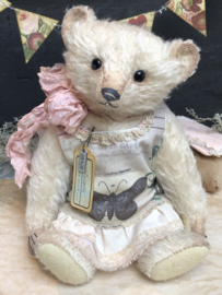 Hug Me Again Collectible bear "Rosalie" standing about 10.5 inch tall.