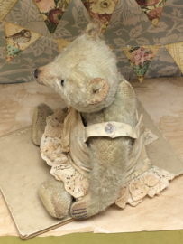 Hug Me Again Collectible bear "Betty" standing about 9" inch tall.