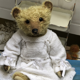 Hug Me Again Collectible bear "Olivia" standing about 12.5 inch tall.