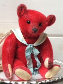 Hug Me Again Collectible bear "Little Atlas" standing about 9.5 inch tall.