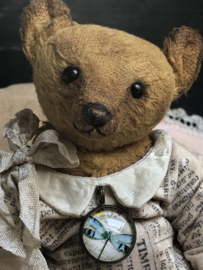 Hug Me Again Collectible bear "Theodore" standing about 6 inch tall.