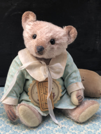 Hug Me Again Collectible bear "Pretty Patty" standing about 9" inch tall.
