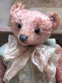 Hug Me Again Collectible bear "Pierre" standing about 9 inch tall.
