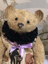 Hug Me Again Collectible bear "Candy~Muncher" standing about 6 inch tall.