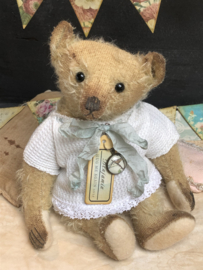Hug Me Again Collectible bear "Benjamin" standing about 9 inch tall.