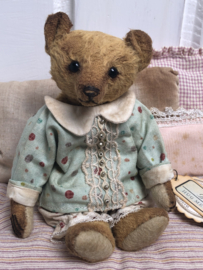 Hug Me Again Collectible bear "Pokkie" standing about 6 inch tall.