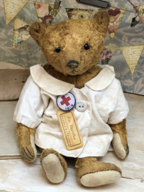 Hug Me Again Collectible bear "Doc Charlton" standing about 10" inch tall.
