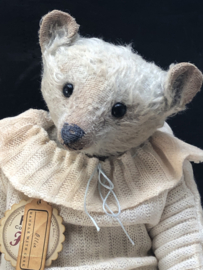 Hug Me Again Collectible bear "Ollie" standing about 13 inch tall.