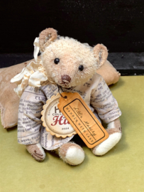 Hug Me Again Collectible bear "Little Munchy" standing about 6 inch tall.