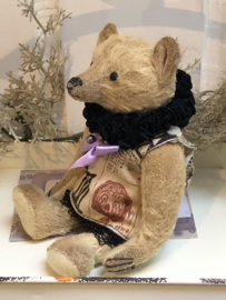 Hug Me Again Collectible bear "Candy~Muncher" standing about 6 inch tall.