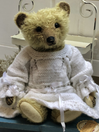 Hug Me Again Collectible bear "Olivia" standing about 12.5 inch tall.
