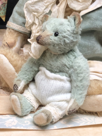 Hug Me Again Collectible bear "Quinn" standing about 6 inch tall.