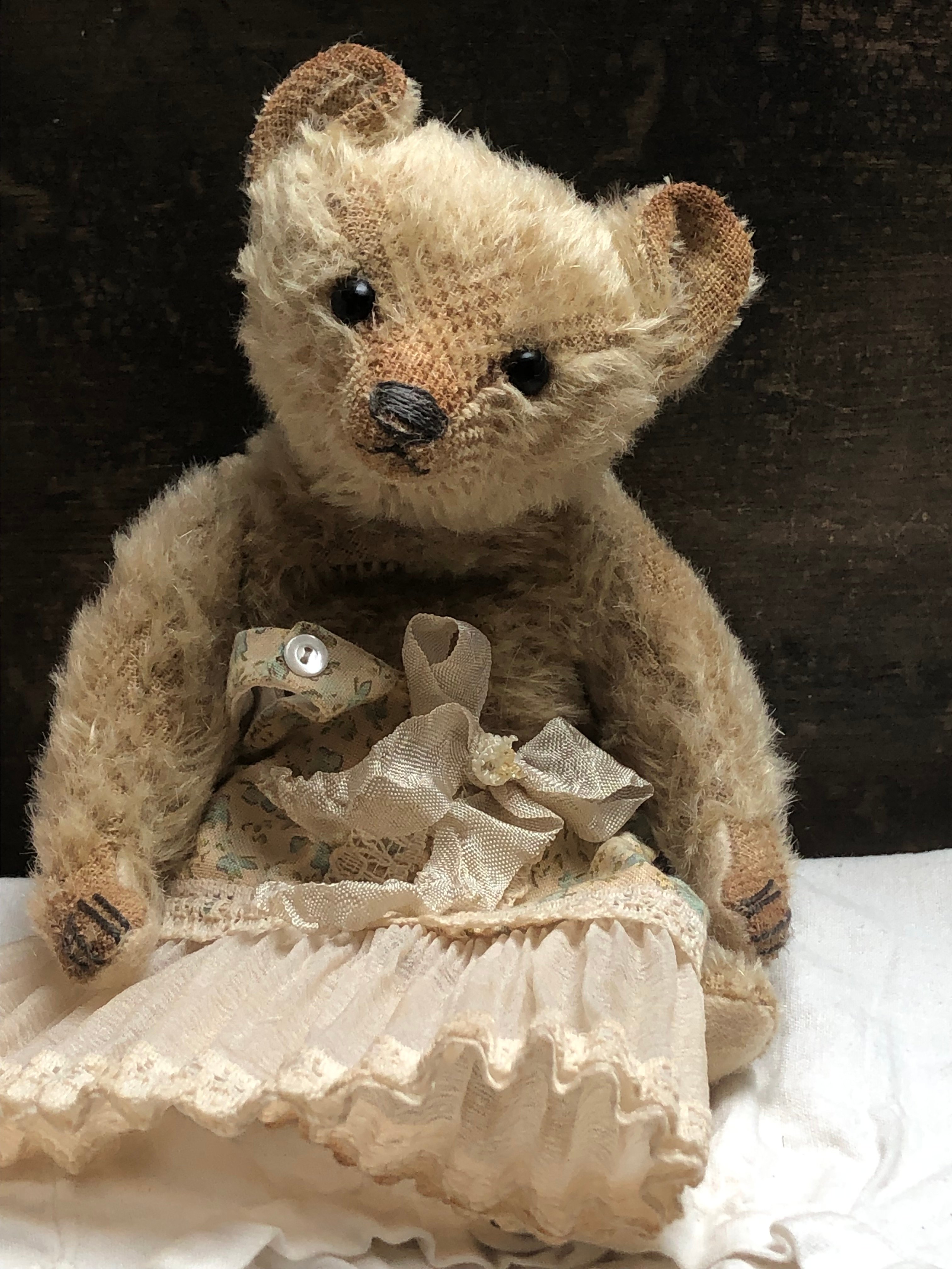 Hug Me Again Collectible bear "Colette" standing about 7.5 inch tall.