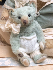 Hug Me Again Collectible bear "Quinn" standing about 6 inch tall.