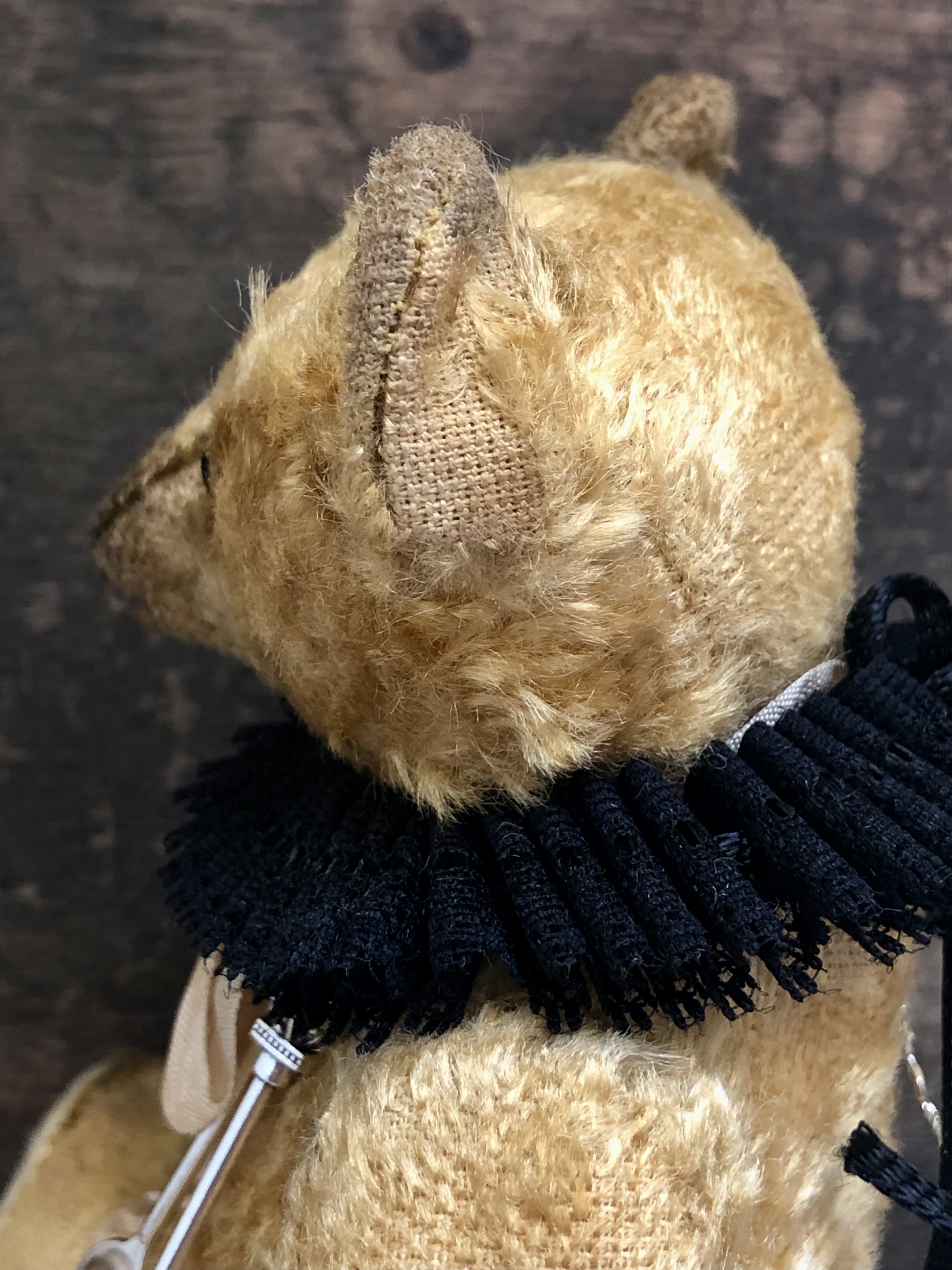 Hug Me Again Collectible bear "Florian" standing about 7.5 inch tall.