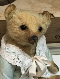 Hug Me Again Collectible bear "Channella" standing about 10" inch tall.