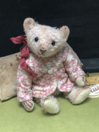 Hug Me Again Collectible bear "Tiny Bibby" standing about 6 inch tall.