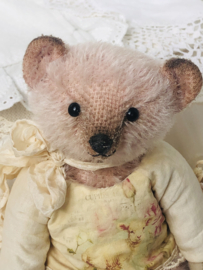 Hug Me Again Collectible bear "Little Livia" standing about 7 inch tall.