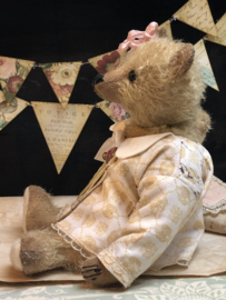 Hug Me Again Collectible bear "Lucette" standing about 10.5 inch tall.