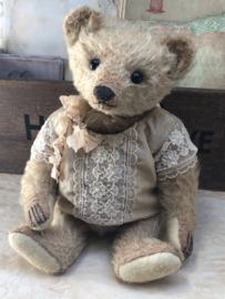 Hug Me Again Collectible bear "Sandy" standing about 9 inch tall.
