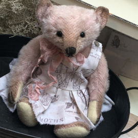 Hug Me Again Collectible bear "Miss Moththea" standing about 9" inch tall.