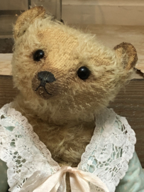 Hug Me Again Collectible bear "Channella" standing about 10" inch tall.