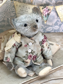 Hug Me Again Collectible bear "Tiny Stella" standing about 6 inch tall.
