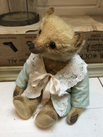 Hug Me Again Collectible bear "Channella" standing about 10" inch tall.