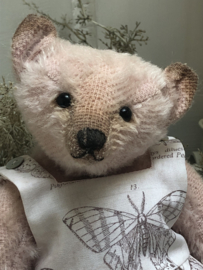 Hug Me Again Collectible bear "Miss Moththea" standing about 9" inch tall.