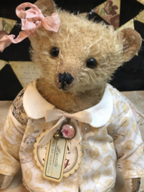 Hug Me Again Collectible bear "Lucette" standing about 10.5 inch tall.
