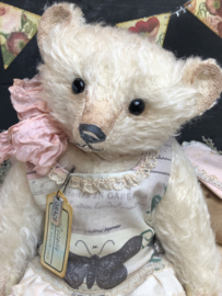 Hug Me Again Collectible bear "Rosalie" standing about 10.5 inch tall.