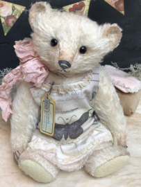 Hug Me Again Collectible bear "Rosalie" standing about 10.5 inch tall.