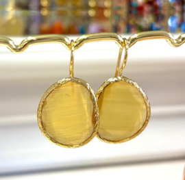 Oorbellen groot cateye geel