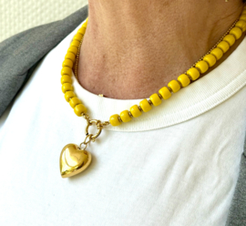 Ketting glaskralen geel /hart goud