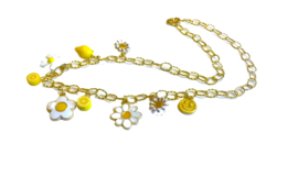 Necklace with charms of daisies and lemon