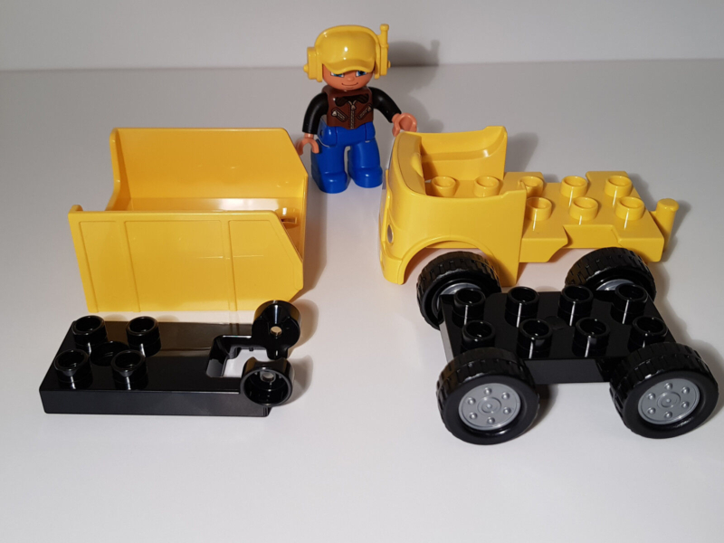 Lego Duplo geel autootje met kiep bak en bouwvakker