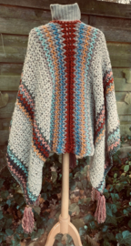 HAAKPAKKET PONCHO/OMSLAG COLORS.