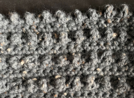 HAAKPAKKET PLAID RUSTIC RELIEF.