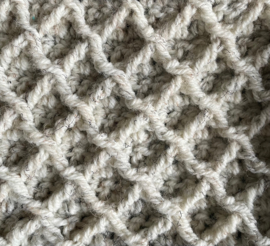 HAAKPAKKET PLAID RUSTIC RELIEF.