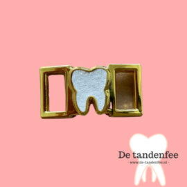 Shoe charm golden tooth