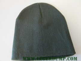 Groene muts met rood wit blauwe ster