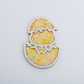 Houten vulvorm kuikentje uit het ei