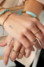 Ring | Elastic bead | Goud/groen