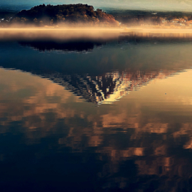 Volcano over water