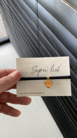 Zwart armbandje met gouden hart