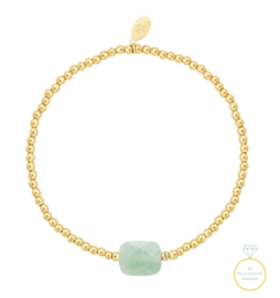 Gouden kralenarmband met grote steen Groen